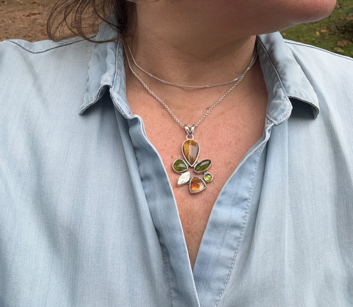 Tiger's eye, vesuvianite and citrine necklace on model